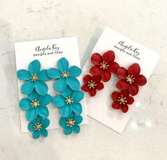 The matte paint on these flowers is super silky soft! Both colors came out beautifully! Great gift for any occasion and perfect summer accessory! Red measures approximately 2" and blue measures approximately 3" Blue 3d Flowers Earrings, Handmade Blue Flower Earrings, Blue Handmade Flower Earrings, Turquoise Flower Earrings For Summer, Red Hand-painted Flower Earrings For Gifts, Red Handmade Flower Earrings, Blue Flower-shaped Earrings For Gifts, Summer Gift Flower Earrings With Handmade Flowers, Summer Handmade Flower Earrings As A Gift