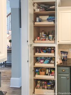 an open pantry with lots of food in it