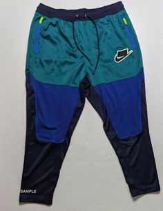 Up for sale is a brand new with tags Nike Men's Sportswear INNOVATION Track Pants in size XL.  It is in excellent condition with no rips or tears.  Thanks for your interest! Measurements: 18 inches waist laid flat, 40 inches waist to bottom.