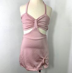 a mannequin is wearing a pink dress on a dummy's neckline