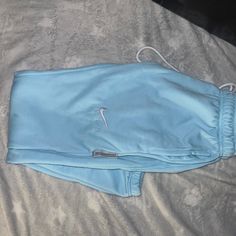 Brand New !!!!!!With Tags And All Never Worn New Witg Tags Size Xs Suchhhhhhh A Pretty Baby Blue Nice And Clean. Brand New With Tags And Never Been Worn They Looks Better In Person !!! They Also Got Zippers On Sides Too That Are Silver .Wish They Fit Me. But We’re Too Small. Retail For Over 250$ Selling For 100$. I Already Went Down On Price A Lot. Make Me Offer . No Flaws At All All Real Fly!!!! Light Blue Nike Joggers, Cheap Blue Sports Joggers, Blue Nylon Jogging Pants, Moisture-wicking Blue Sweatpants For The Gym, Blue Moisture-wicking Sweatpants For Gym, Grey Nike Joggers, Black Nike Sweatpants, Nike Track Jacket, Nike Sweats