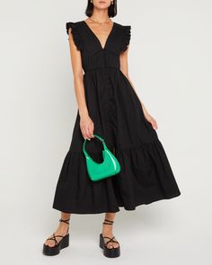 First image of Stella Dress, a black midi dress, front buttons, ruffle sleeve, open back, tied ribbon, bow, tiered Dramatic Sleeves, Stella Dress, Simple Black Dress, Fashion Tape, Classic Wardrobe, Ruffled Sleeves, Price Comparison, Tie Dress, Tiered Skirt