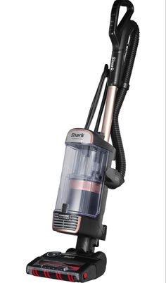 a black and silver vacuum cleaner on a white background with the words shark written below it