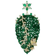 Cast in 18 Karat gold, this beautiful pendant features 23.33 carats of carved Jade, .64 carats emerald, .56 carats sapphire & .96 carats of sparkling diamonds. FOLLOW MEGHNA JEWELS storefront to view the latest collection & exclusive pieces. Meghna Jewels is proudly rated as a Top Seller on 1stDibs with 5 star customer reviews. All items manufactured by us are handmade and can be customized or redesigned. Composition Size-66X30 Total Weight-10.627 Gold Weight(Gms)-5.53 Diamond Wt(Cts)-0.96 Emera Emerald Diamond Pendant, Gold Leaf Pendant, Flower Carving, Designer Handmade Jewellery, Carved Jade, Yellow Gold Jewelry, Antique Necklace, Modern Necklaces, Jade Carving