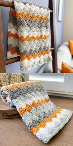 an orange and gray blanket is hanging on a chair