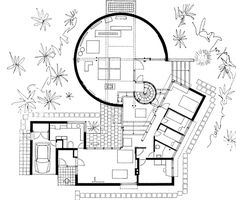 an aerial view of the house from above, with floor plans in black and white