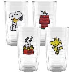 four glass cups with cartoon characters on the front and bottom, one has a snoopy dog