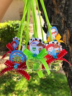 a bunch of glass ornaments hanging from a tree