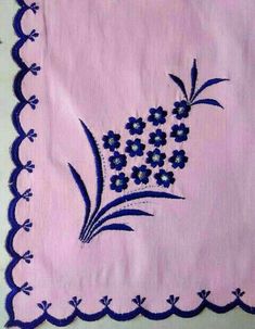 a pink and blue cloth with flowers on it