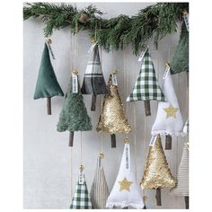 christmas tree ornaments hanging on a wall