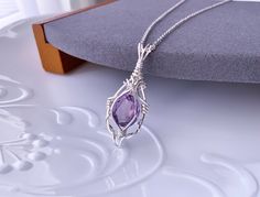 "Handmade item: Size: 40 x 16 mm + Chain 1,6 mm 45 cm  Materials: Silver Plated Chain 1.6 mm 45 cm/ 18\" Amethyst Gemstone 12 x 9 mm Shape: oval Color: Purple 925 Sterling Silver Square Wire (SOFT) 21 Ga 925 Sterling Silver Half-Round Wire (Soft) 22 Ga Handmade sterling silver wire wrapped Pendant" Amethyst Oval Pendant Necklace For Gift, Nickel-free Amethyst Crystal Necklaces As Gift, Nickel-free Amethyst Crystal Necklace As Gift, Nickel-free Amethyst Crystal Necklaces For Gift, Amethyst Oval Pendant Jewelry Gift, Lavender Teardrop Pendant Jewelry Gift, Handmade Amethyst Teardrop Pendant Necklace, Amethyst Pendant For Jewelry Making, Amethyst Wire Wrapped Necklace Gift