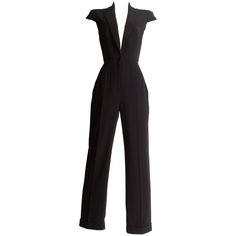 Introducing a sleek and sophisticated Alexander McQueen tuxedo black silk jumpsuit, a standout piece from the spring-summer 2008 collection. This jumpsuit exemplifies the brand's impeccable tailoring and innovative design. With its padded shoulders and capped sleeves, the jumpsuit exudes a sense of power and elegance, reflecting Alexander McQueen's bold and visionary style. The deep v-neck adds a touch of allure and femininity, while the cigarette pants create a streamlined and chic silhouette. Prepare to embrace the allure of this Alexander McQueen tuxedo black silk jumpsuit, a true representation of haute couture at its finest. With its modern yet timeless design, this jumpsuit promises to be a standout addition to any sophisticated wardrobe, capturing the essence of effortless style and Alexander Mcqueen 2017, Alexander Mcqueen 2016, Black Silk Jumpsuit, Alexander Mcqueen Menswear, Alexander Mcqueen Runway, Tuxedo Jumpsuit, Black Skirt Suit, Png Clothes, Mcqueen Fashion