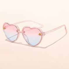 Our Lux Cutie Sunnies give her look a boost of fun and flair! The perfect accessory to show off her cool style while keeping the sun out of her eyes. Perfect for beach, pool, or party - these trendy shades add some extra cuteness to any outfit. Keep your little diva looking bright and stylish! Cheap Cute Pink Sunglasses, Cute Cheap Pink Sunglasses, Pink Preppy Sunglasses, Adjustable Summer Sunglasses With Uv Protection, Playful Sunglasses With Uv Protection For Vacation, Playful Summer Sunglasses For Vacation, Playful Summer Vacation Sunglasses, Playful Multicolor Sunglasses With Gradient Lenses, Fun Blue Sunglasses For Summer