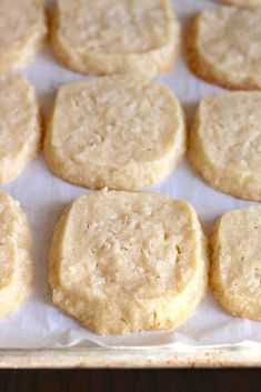 several cookies on a baking sheet ready to be baked