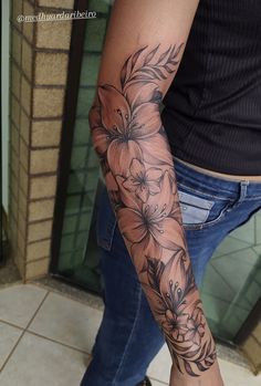 a person with a flower tattoo on their arm