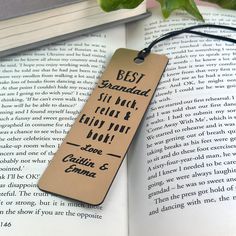 a bookmark with the words best grandma, sit not far from our hot one