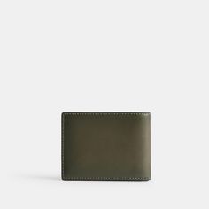 Crafted of refined leather this slender wallet features six card slots and a full-length bill compartment in a neat bifold design that slips easily into pockets. | Coach Slim Billfold Wallet - Army Green Classic Coach Trifold Wallet With Card Slots, Coach Bifold Card Holder With Interior Slots, Coach Bifold Card Holder For Formal Occasions, Classic Coach Card Holder With Coin Pocket, Coach Rectangular Trifold Wallet With Coin Pocket, Coach Trifold Wallet With Coin Pocket For Formal Use, Coach Trifold Wallet With Rfid Blocking For Formal Use, Coach Trifold Wallet With Rfid Blocking, Classic Coach Bifold Card Holder