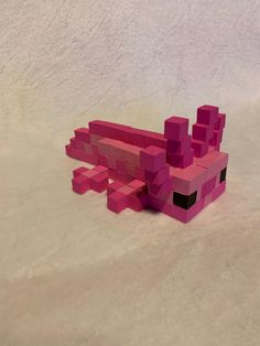 Handmade Minecraft axolotl block art Axolotl Minecraft Block Art, Minecraft Block Craft, Minecraft Flowers Wooden Blocks, Minecraft Wooden Block Crafts, Minecraft Block Art, Clay Minecraft