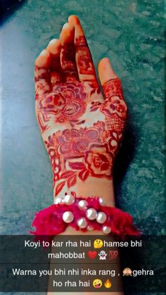 a woman's hand with henna on it and the words kopi to kar that hai hai hamse bhi