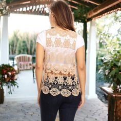 Add a touch of beauty and femininity to your wardrobe with the Anna-Kaci Women's Floral Crochet Open Front Vest. This stunning vest cardigan features delicate crochet lace trim, a sleeveless design, and an open front, offering versatility to layer over tops, dresses, or swimsuits for a stylish and effortless look, whether you're running errands or hitting the beach. Lace Tops With Crochet Trim For Layering, Feminine Crochet Top With Lace Patchwork For Spring, Feminine Lace Patchwork Crochet Top For Spring, Spring Lace Top With Patchwork For Layering, Spring Lace Top For Layering With Lace Patchwork, Spring Lace Top With Lace Patchwork For Layering, Crochet Lace Top For Layering, Lace Crochet Top With Lace Trim For Layering, Lace Top With Lace Patchwork For Spring Layering