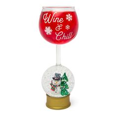 a wine glass that has been decorated with snowmen