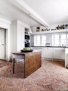 the kitchen is clean and ready to be used as a dining room or family room