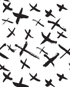 an image of many different crosses painted on white paper with red and black inks