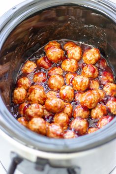 the food is being cooked in the slow cooker