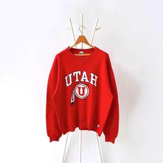 90s University of Utah Utes sweatshirt/ L * PLEASE READ BEFORE PURCHASE * PLEASE consider the PHOTOS before making the decision * The images may DIFFER in appearance from the actual product because we took pictures under daylight.  * PLEASE send your PHONE NUMBER after your purchase for the shipping company to contact you X No returns X No refund Condition : 8/10 More details : stains ( sleeves)/ look at the pictures  Brand : Russell Size : L Pit to pit/ Chests : 24.5/49 inches  Length : 28 inches  Material : cotton polyester  Color : red * ALL ITEMS are VINTAGE which may show some signs of wear and tear * Due to the different display and different light, the picture may not reflect the actual color of the item * Please, remember that our items are vintage so they may show some signs of we Utah Utes, University Of Utah, Shipping Company, Phone Number, Utah, Sweat Shirt, Gender Neutral, Thailand, University