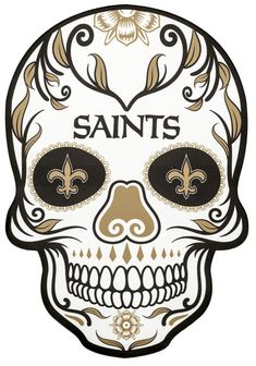 a white and gold skull with the saints on it's face is seen in this image