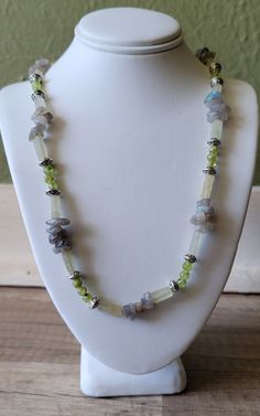 A unique 19 in. Peridot, Green Aventurine and Labradorite Necklace!! All gemstones are natural - no lab created!! Peridot - Grade: D  Color:  Greens Green Aventurine - Grade:  C  Color:  Greens/Clear Labradorite - Grade:  C  Color:  Grays **Note length of necklace might vary +/- quarter of an inch** Prehnite Gemstone Beads Necklace For Gift, Green Labradorite Necklaces With Natural Stones, Green Nature-inspired Crystal Necklace With Natural Stones, Wedding Necklaces, Peridot Green, Labradorite Necklace, Bowling Green, Labradorite Necklaces, Wedding Jewellery Necklace