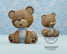 two brown teddy bears sitting next to each other on a blue and white wallpaper