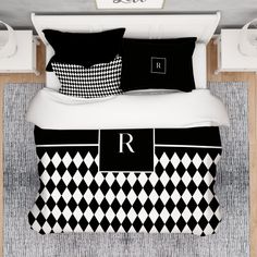 black and white bedding with monogrammed pillows