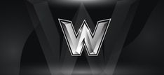 the letter w is made up of silver and black geometric shapes on a dark background