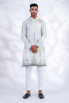 White kurta with light green floral resham, mirror and dori work. Paired with a pant. - Aza Fashions White Chanderi Sherwani With Floral Embroidery, White Chanderi Sherwani With Mirror Work, Pista Green Cotton Sherwani With Resham Embroidery, White Lawn Suit With Mirror Work For Festivals, Traditional White Lawn Suit With Mirror Work, White Lawn Suit With Mirror Work For Diwali, Dori Work, Men Kurta, White Kurta