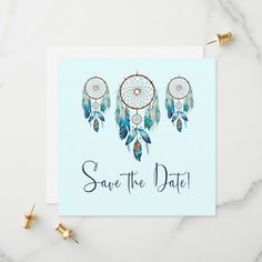 save the date card with dream catchers on it