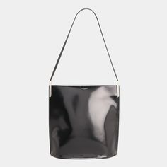 Saint Laurent "Suzanne" shoulder bag in patent calf leather Flat shoulder strap Structured top with magnetic closure  Silver-tone hardware Interior, one zip pocket  Approx. 4.3"H x 4.5"W x 3.9"D Made in Italy Chic Formal Patent Leather Shoulder Bag, Chic Glossy Finish Shoulder Bag, Rectangular Patent Leather Shoulder Bag With Glossy Finish, Glossy Patent Leather Rectangular Shoulder Bag, Rectangular Glossy Patent Leather Shoulder Bag, Chic Patent Leather Shoulder Bag For Everyday Use, Modern Patent Leather Shoulder Bag For Everyday Use, Modern Patent Leather Top Handle Bag, Modern Patent Leather Evening Bag