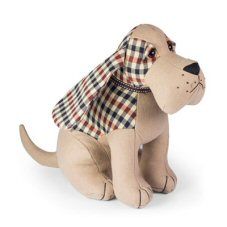 a stuffed dog with a plaid collar and leash sitting on the ground next to a white background