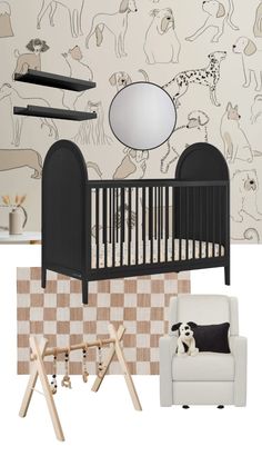 a baby's room with black and white decor