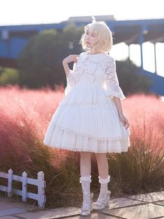 This price includes the JSK only, others are not included.   	 		 			Size 			S 			M 			L 		 		 			Bust 			86 			90 			94 		 		 			Waist 			72 			76 			80 		 		 			Shoulder to Waist 			34.5 			34.5 			35.5 		 		 			Full Length 			92 			93 			94 Cute Cream Skirt For Spring, Harajuku Style White Skirt For Spring, White Knee-length Ruffled Skirt, White Ruffled Knee-length Skirt, White Harajuku Style Ruffled Skirt, White Fairy Kei Skirt With Ruffles, Fitted Harajuku Dress With Bow, White Harajuku Skirt With Ruffles, White Ruffled Balletcore Dress