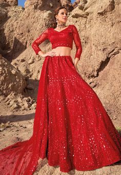 Red net lehenga choli for wedding 7401 Desc: Style : Circular Lehenga Choli Color : Red Fabric : Net Work : Embroidery Mirror Sequence Wash Care : Dry clean Sleeve Style : Quarter Sleeve Long Sleeves : Done only in Custom Stitch Sleeves Lining : Done only in Custom Stitch Bust Size : 32 to 42 Inches Occasion : Wedding Mehendi Sangeet Engagement Reception Ceremonial Baby Shower Teej. With Express Free Shipping Buy Lehenga - Indian Party wedding and bridal Red net lehenga c... Red Color Outfits, Net Lehenga Choli, Heavy Lehenga, Designer Bridal Lehenga Choli, Resham Embroidery, Designer Bridal Lehenga, Choli Designs, Net Lehenga, Lehenga Skirt