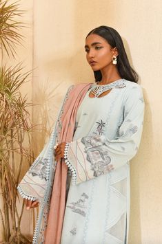 Description: This outfit features a pale blue khaddar shirt adorned with intricate embroideries and paired with a peachy pink karandi embroidered dupatta that beautifully complements the shirt. The set is completed with a comfortable plain trouser, making it perfect for all your wardrobe. Materials:Shirt (Khaddar) - Embroidered with karandi embroidered dupatta and khaddar trousersBeautifully composed embroideries and indigenous elements are stitched laboriously in celeste shade thread making “Eva” heavenly. Layered with all-round embroidered dupatta, and plain trouser. This design is a perfect fit for all your winter affairs. *Disclaimer: Due to the many variations in monitors and browsers, the color of products may appear different on different monitors. **Additional decorative trim has b Embroidered Dupatta, Suit Fabric, 3 Piece Suits, Pakistani Outfits, Peachy Pink, Pakistani Dresses, Pale Blue, Party Wear, Casual Wear