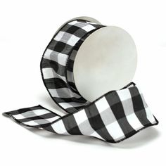 a black and white checkered ribbon on a white background