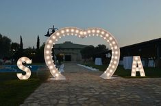 lighted letters spelling out the word love at dusk