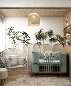 a baby's room decorated in white and blue with palm trees on the wall