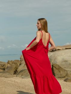 Discover our limited edition Olivia Maxi Dress. This red dress perfectly blends style, comfort, and versatility, effortlessly transitioning from day to night with its maxi length. It features an adjustable scoop back, rope detail straps, and ruffles for a chic vacation vibe. Features: Maxi length Side pockets Adjustable scoop-back Lightweight feel Viscose- French silk Handmade in Thailand, designed in the U.S Care instructions: Hand washing recommended or gentle machine wash with low heat dry Re Vacation Dress With Adjustable Straps In Red, Red Beach Dress With Adjustable Straps, Red Vacation Dress With Adjustable Straps, Red Ruffled Maxi Dress For Beach, Red Ruffled Maxi Dress For Vacation, Chic Red Maxi Dress For Beach Season, Red Spaghetti Strap Maxi Dress For Beach, Red Spaghetti Strap Beach Maxi Dress, Red Spaghetti Strap Maxi Dress With Ruffles