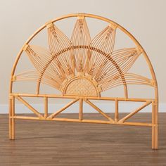 a bamboo bed frame with an intricate design