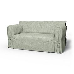 a couch that is sitting on top of a white surface with no one around it