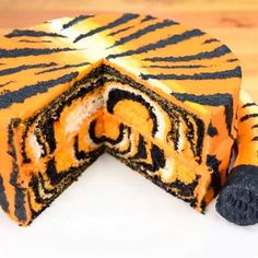 a tiger print cake on a white plate