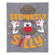 a towel that says seriously silly with a cartoon character in the middle and an image of a